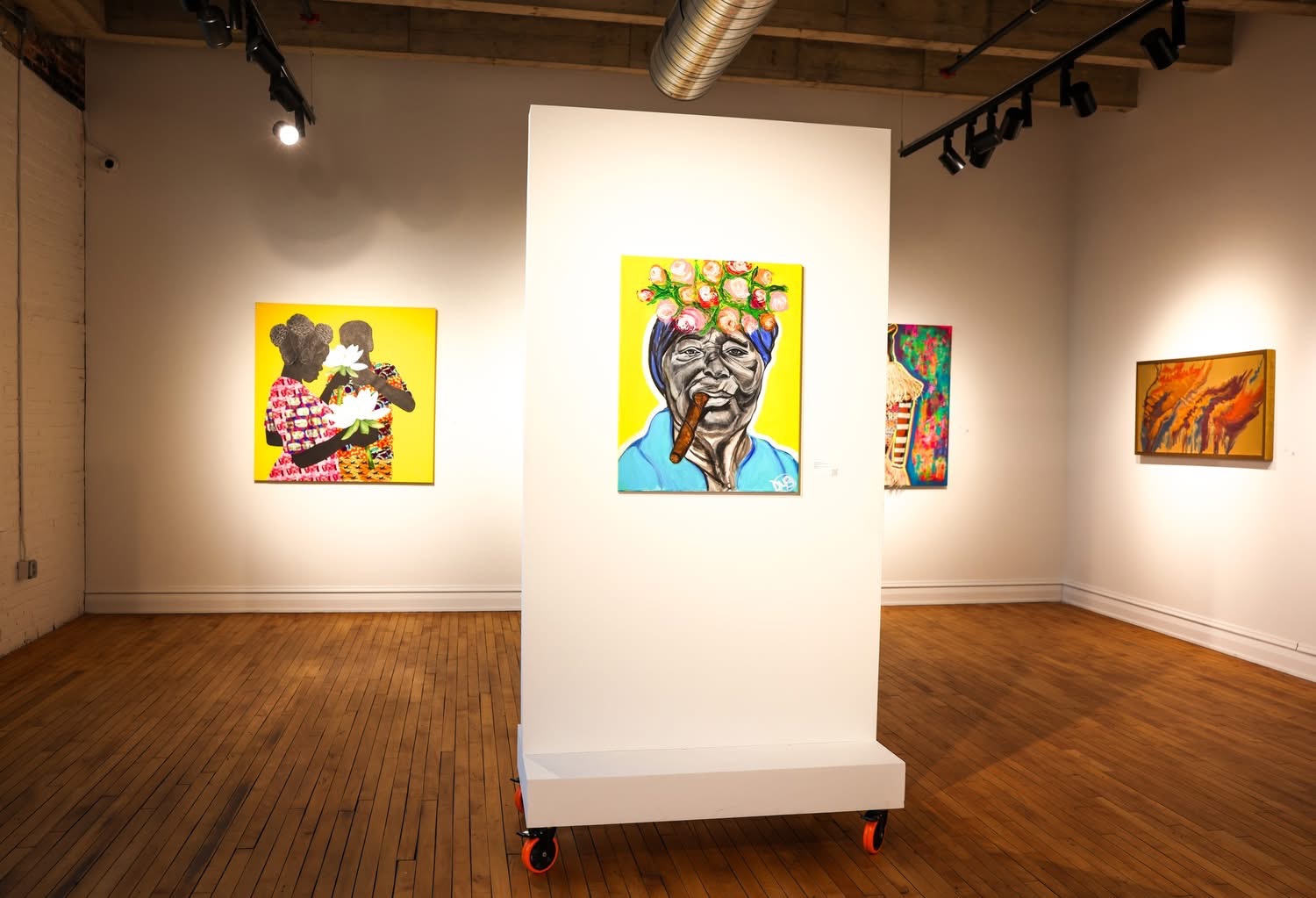 Artwork installed inside the 2026 Reclaiming the Canvas exhibition